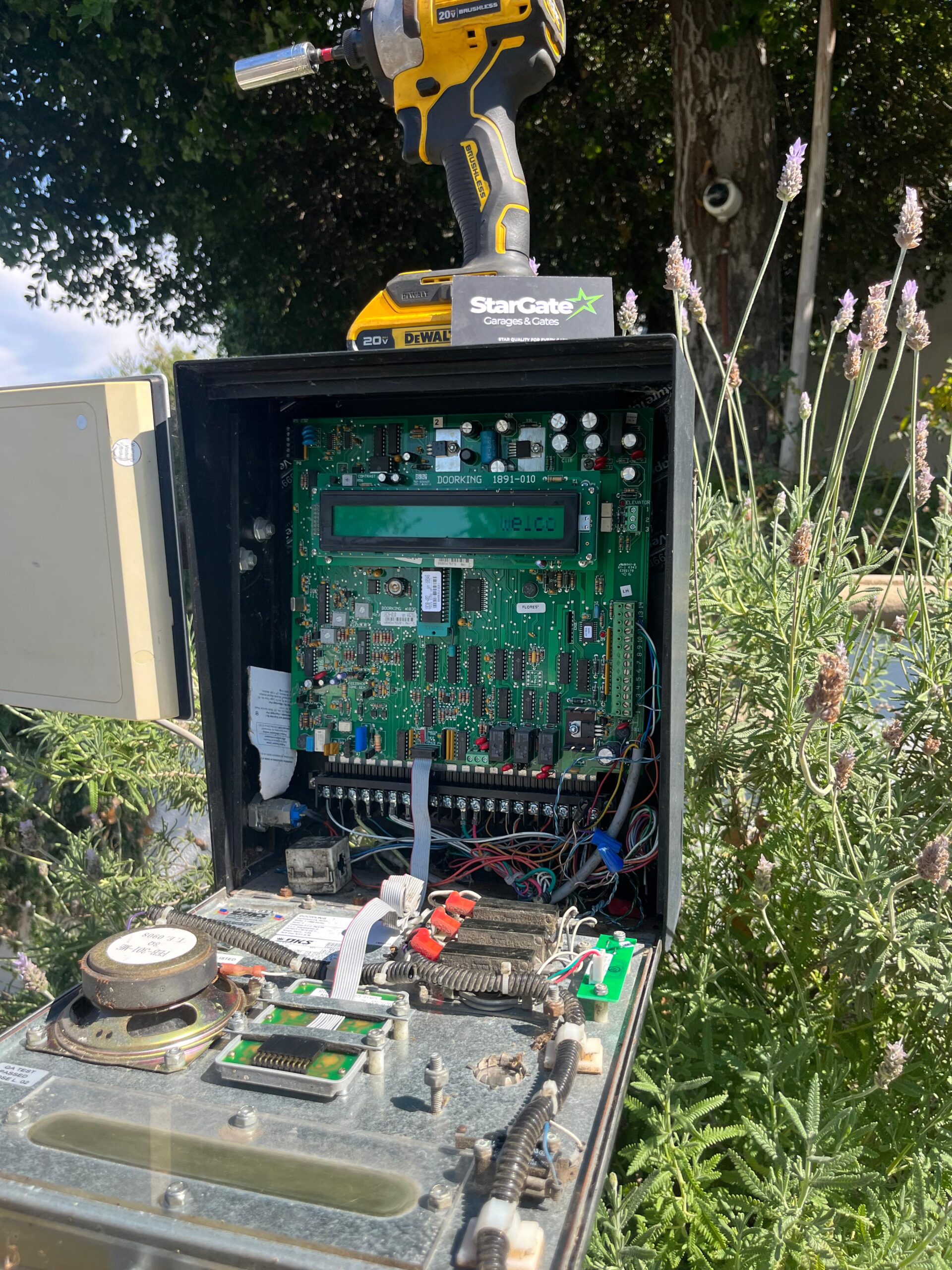 StarGate Garages technician repairing electric gate Los Angeles